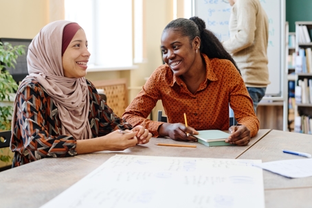 Joyful Women During Lesson stock photo